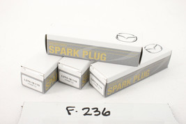 New OEM Spark Plug L3Y4-18-110 ITR6F13 3S4G-12405-AB 1999-2006 NGK Set of 4 - $22.77