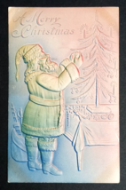 A Merry Christmas Santa Decorating Xmas Tree Airbrushed Embossed Postcard c1908 - $9.99