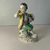 Antique Meissen Porcelain Boy Holding Flowers in Yellow - $399.00