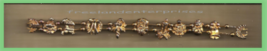 Christmas BRACELET #035 Goldtone 9 Slide Charms+Crescent Moon-7 1/2 inch w/Clasp - £15.74 GBP