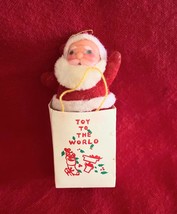 Vintage Kitsch Ornament Flocked Santa Claus In Shopping Christmas Gift Bag - $8.90