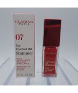 Clarins Lip Comfort Oil Shimmer 07 RED HOT - $470.22 MXN