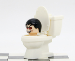 Custom Mini-figure Miniature Skibidi Toilet Man Toilet Man White buildin... - £1.99 GBP
