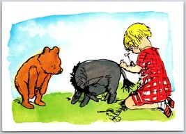 Winnie the Pooh Postcard Christopher robbin putting Eeyores tail back on - $11.40