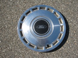One genuine 1984 1985 Ford Tempo 13 inch hubcap wheel cover - $20.75