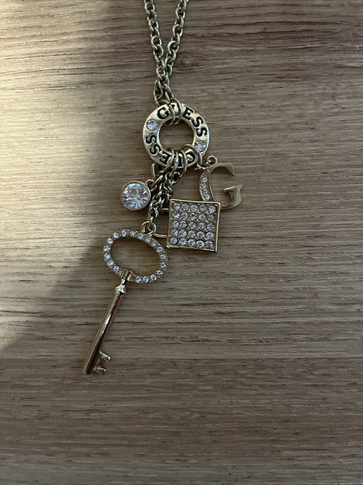 Guess  Gold Tone  Logo Lock-Key Pave Charm Necklace - £26.00 GBP