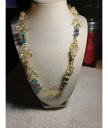 21 In Blue And Clear Beaded Necklace With Gold Colored Wire Pendant - $27.10