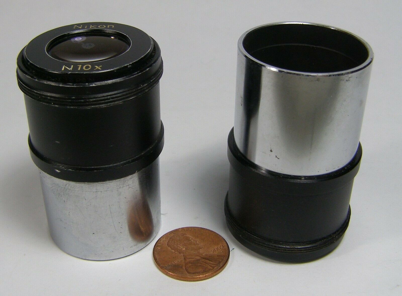 Primary image for Nikon Microscope Eyepieces 2ct.  N10X  one has a scratch-see pics