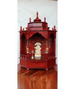 The temple is made of wood and brown color. It has 1 drawers, 1 puja shelf - $258.18+