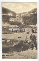 tq0539 - Devon - Fisherman watches Boats at the Harbour, in Clovelly - Postcard - £1.99 GBP