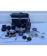 Minolta SRT 101 35 MM Camera With 3 Extra Lenses &amp; Extras In Case - $222.74