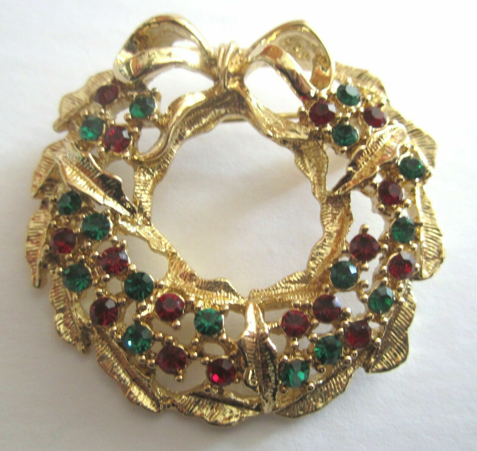 Primary image for Christmas Wreath Brooch Pin Red and Green Rhinestones Gold Tone Setting 1960s