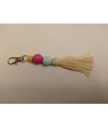 Style and Elegance in your Keys: Discover our Key Ring with Tassel and Balls - $2.30