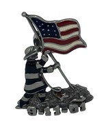 Silver 9-11 fireman pin with enameled flag. - $17.89 CAD