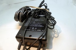 Canon Ni-Cd battery Charger E1   Genuine  OEM vintage - $36.16