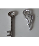 Sterling Silver CZ heart and key Pendant With loose cz New - $239.71 MXN