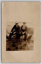 RPPC Two Handsome Men Resting on Tree Log at Waters Edge Postcard E24 - £11.73 GBP