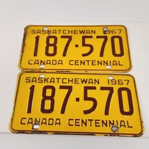 Saskatchewan License Plate Pair 1967 Canada Centennial 187-570 Yellow Vintage - £37.77 GBP