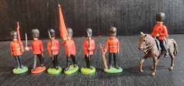 BRITAINS TOY SOLDIERS PLASTIC QUEENS GUARDS WITH BANNER AND CAVALRY  SET... - $20.78