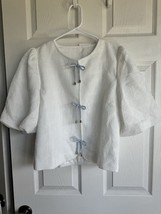 Chic White Blouse with Subtle Blue Bows Has Snap Closures And Puff Sleeves - $16.20