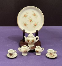 Vintage Japan Miniature 10 Piece Porcelain Floral Tea Set with Wooden Stand - $11.29