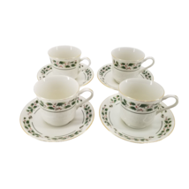 An item in the Pottery & Glass category: Holiday Cup & Saucer Set Fine China Christmas Holly set of 4 Japan