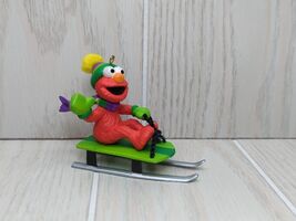 Sesame Street Elmo on green sled wearing hat scarf 2001 Christmas Tree O... - $7.20