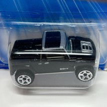 Hummer H3T Hot Wheels Collectible Diecast Car 2004 First Editions Black New - $9.49