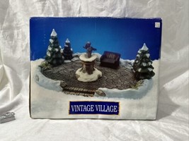 1990s Dept.18 christmas Park vintage Village porcelain holiday figure se... - $18.69
