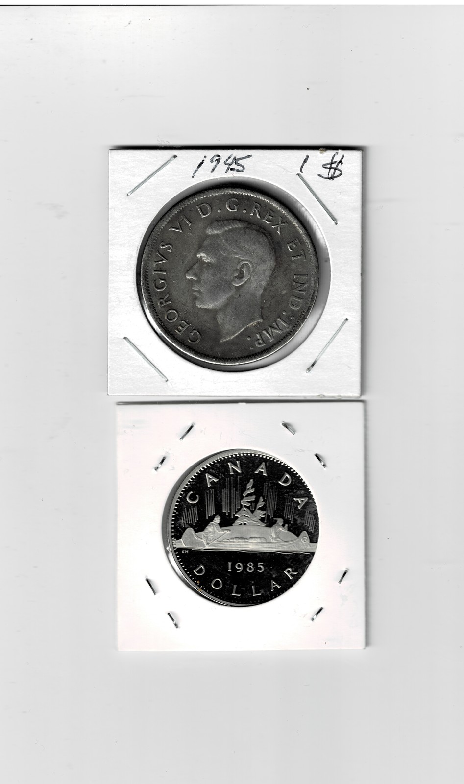 TWO CANADAIN SILVER DOLLARS /1945 LARGE SILVER FINE/ 1985 SMALL SILVER F... - $29.99