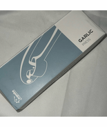 Garlic press new in the box - $5.65 CAD