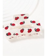 Lady bug white  hair claw - $232.89 MXN