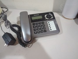 Panasonic KX-TG1061 Corded Telephone  Answering Machine With Power Adapter - $24.75