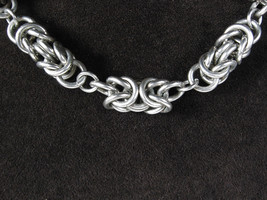 Vintage Knotted Twist Necklace Silvertone Choker Chain Graduated Sized Knots 16&quot; - £12.46 GBP