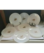 7 FIREKING MILK GLASS 9&quot; PLATES WITH GAME BIRD PATTERN - $433.22 MXN