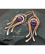 Handmade amethyst earrings: wire wrapped flowing curves - €25,67 EUR