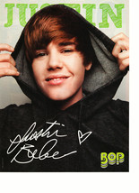 Justin Bieber teen magazine pinup clipping putting his black hoddie on P... - $3.50