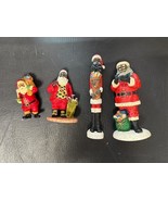 4 African American Santa Figurines - $37.99