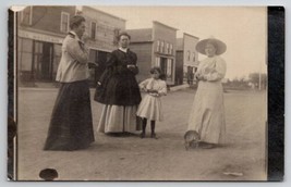 RPPC Edwardian Ladies Little Girl And Dog In Town Dirt Street Photo Postcard F45 - £12.09 GBP