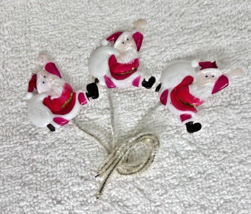 3 Vintage Hard Plastic Happy Jumping Santa w Toy Bag Pick Chenille Wire - $14.36