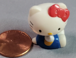 Sanrio Hello Kitty Miniature 1 inch PVC Figurine Sitting - £11.65 GBP