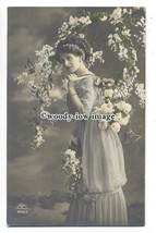 gla0047 -  A Young Lady in an Unusual Style Long Dress with Flowers - postcard - £1.99 GBP