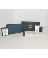 New MCM Aren Zip Around Wallet in Embossed Monogram Leather Teal - $8,010.87 MXN