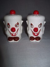 Vintage Figurine Salt &amp; Pepper Shakers Garbage Cans Clown Face - $9.95