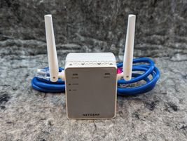 NETGEAR WiFi Range Extender EX2700 N300 Wireless Signal Booster Repeater - $5.99