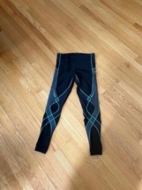 CW-X men’s Black Compression Leggings with Green Stitching - $99.00