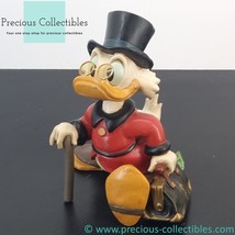 Extremely rare! Scrooge McDuck with a suitcase full of money statue. Dis... - $595.00