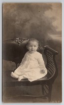 RPPC Darling Baby Girl Precious Eyes Blonde Hair on Chair Postcard H21 - £5.22 GBP