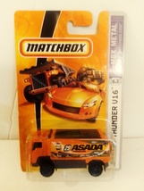 Matchbox 2007 #63 Orange Desert Thunder V16 Asada Heavy Truck Mint On Card - $14.99