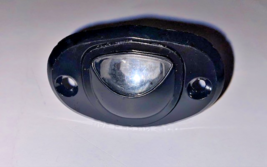 1985-1989 NEW GENUINE MOPAR CHRYSLER FIFTH AVE. LICENSE LAMP, P/N 4076808 - $32.52